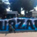 Una bandera de Burzaco robada, la causa del feroz choque entre barras de Racing e hinchas colombianos en Gerli